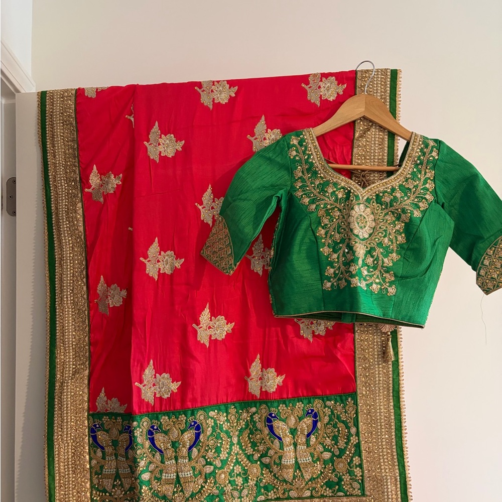Green Embroidered Indian Blouse with Red and Gold Saree